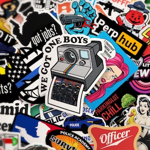 May include: A collection of stickers with various designs and text. Includes a sticker of a Polaroid camera with a photo, a crying woman with pink hair, a hand holding a gun, and the text "Perp hub".