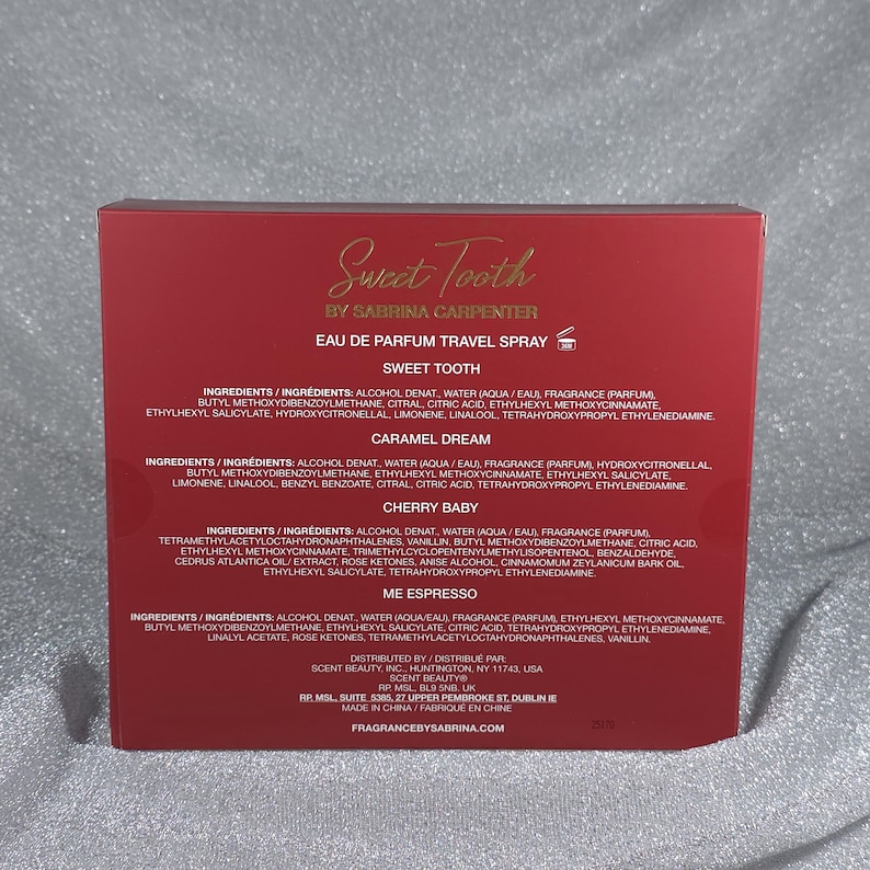 May include: A red box for a travel-sized Eau de Parfum spray by Sabrina Carpenter. The box features the text "Sweet Tooth" in gold script, along with ingredient lists for "Sweet Tooth", "Caramel Dream", "Cherry Baby", and "Me Espresso" fragrances.