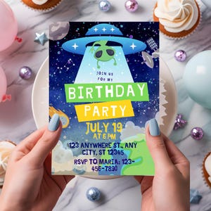 May include: A blue and green birthday party invitation with a cartoon alien spaceship and stars. The text reads "Join us for my Birthday Party, July 19 at 6 PM, 123 Anywhere St., Any City, ST 12345, RSVP to Maria: 123-456-7890".