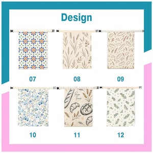 May include: Six rectangular fabric bags with roll-top closures and black plastic buckles, labeled 07 through 12. Designs include geometric tiles, wheat stalks, bread patterns, blue floral prints, a loaf with the text Pain Frais, and green sprigs.