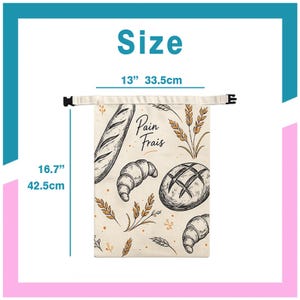 May include: A rectangular off-white fabric bread bag with a black buckle closure, featuring a printed pattern of bread loaves, croissants, and wheat stalks with the text Pain Frais. It measures 13 inches wide by 16.7 inches in total height.
