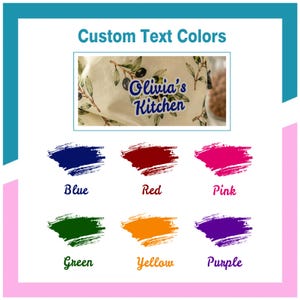May include: A fabric item with an olive branch pattern featuring the text Olivia's Kitchen. Below, six paint brush strokes display color options labeled Blue, Red, Pink, Green, Yellow, and Purple, showcasing the available custom text colors.