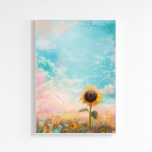 May include: A framed art print featuring a vibrant sunflower against a backdrop of a colorful sky. The artwork showcases a large sunflower with yellow petals and a dark center, set against a sky of blue, pink, and white hues. The overall style is painterly.