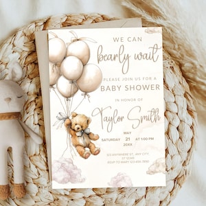 May include: Baby shower invitation with a teddy bear holding balloons. The invitation has the text "We can bearly wait" and details for the event, including the name Taylor Smith, date, time, and location.