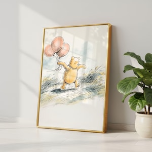 Downloadable Winnie-The-Pooh artwork showcased as a coordinated gallery wall in a toddler room.