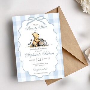 Printable Winnie the Pooh baby shower invitation card with blue gingham pattern and sweet storybook theme