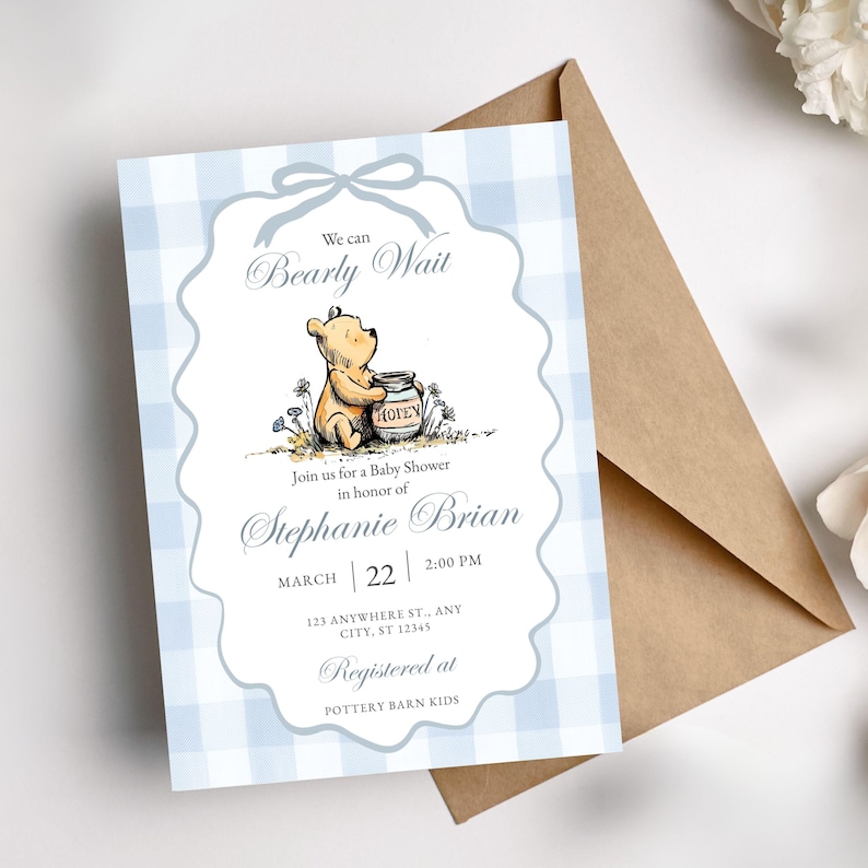 Printable Winnie the Pooh baby shower invitation card with blue gingham pattern and sweet storybook theme