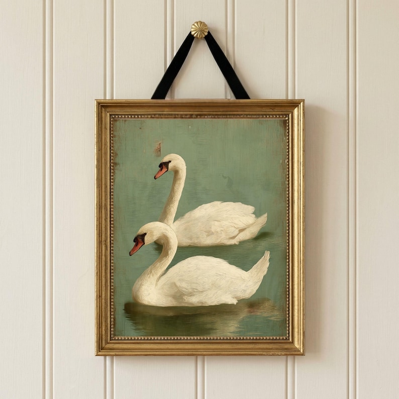 Soft animal artwork set in blush tones displayed as nursery wall decor above crib with delicate floral watercolor style