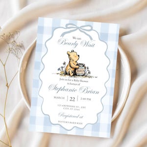 Boy Winnie Pooh baby shower invitation printable with classic Pooh bear and blue gingham plaid background layout
