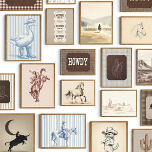 May include: A gallery wall collection of framed art prints featuring Western-themed illustrations. The prints include a goose in cowboy boots, rodeo tickets, a cowboy on a horse, a cat in a cowboy hat, desert landscapes, and the text HOWDY.