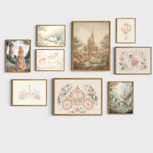 Whimsical art print set showing enchanted castle and unicorn designs with soft pink fairy crown details in a cozy space