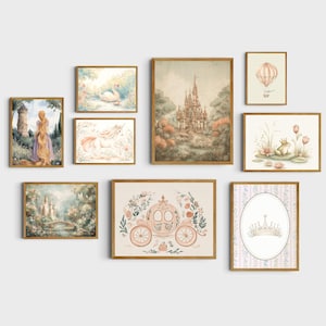 May include: A collection of framed art prints featuring fairytale themes. The prints include illustrations of a castle, a carriage, a unicorn, a swan, a frog with a crown, and a hot air balloon. The color palette is soft with pastel tones.