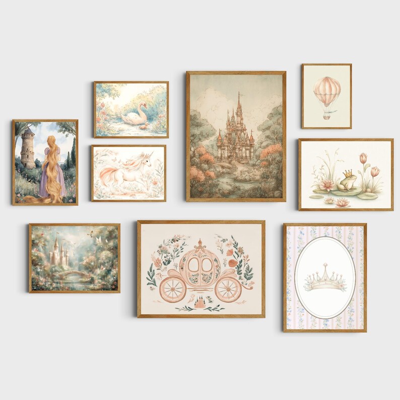 May include: A collection of framed art prints featuring fairytale themes. The prints include illustrations of a castle, a carriage, a unicorn, a swan, a frog with a crown, and a hot air balloon. The color palette is soft with pastel tones.