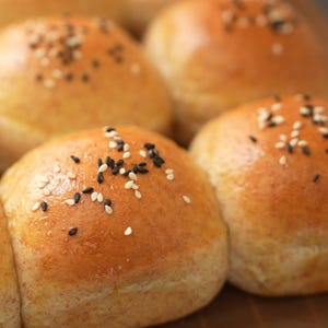 Whole Wheat Dinner Rolls are soft and fluffy, lightly sweetened with a golden crust, making them perfect for any meal.