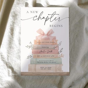 May include: Baby shower invitation with a stack of books, a pink bow, and floral accents. The text reads "A New Chapter Begins" and includes event details: Amelia Smith, September 25th, 3 PM, and an address.