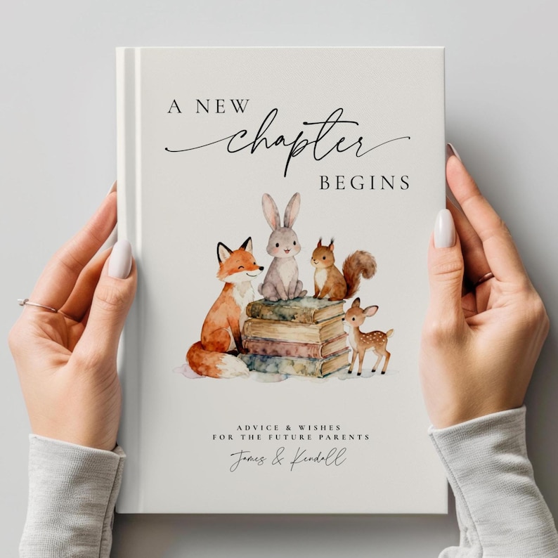 May include: A white book titled "A New Chapter Begins" with watercolor illustrations of a fox, rabbit, squirrel, and deer. The book includes the text "Advice & Wishes For The Future Parents" and personalized names.