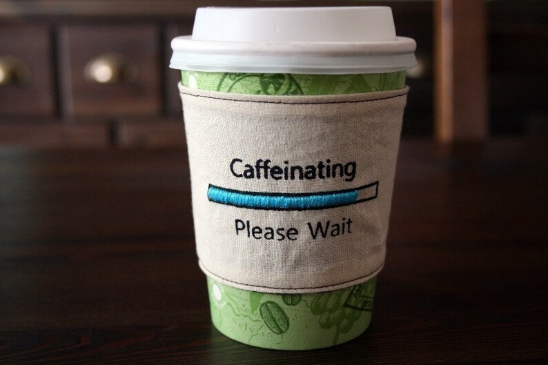 Caffeinating please wait cup cozy image 2