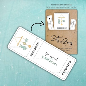 May include: A gift certificate with a baby mobile illustration, featuring a bunny and stars, and the word "GUTSCHEIN". The certificate is in a brown card holder with additional gift tags. The text "Zeit statt Zeug" is also visible.