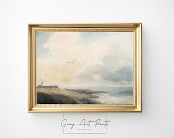 May include: A framed painting of a seascape with a windmill in the foreground. The painting is in a gold frame and has a light blue and white color scheme.
