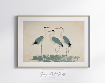 May include: A framed print of a painting depicting three grey herons with orange beaks standing on a green and brown background.