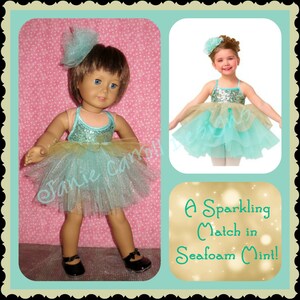 May include: Two dolls wearing matching seafoam green and gold tulle tutus with sequined bodices. The text "A Sparkling Match in Seafoam Mint!" is displayed below the dolls.