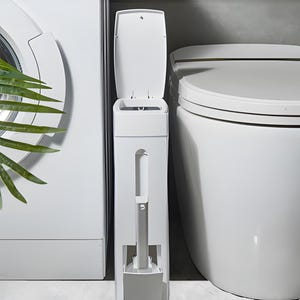 May include: White toilet brush and holder with a lid. The holder is tall and slender, and the brush has a silver handle. The holder is open and the brush is inside.