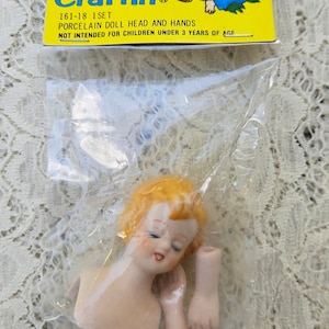Mangelsen&#39;s Porcelain Doll Head and Arms: Vintage Craft Supply