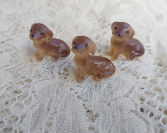 Three Miniature Plastic Dog Figures Tiny Vintage Puppy Craft Pieces or Collectibles