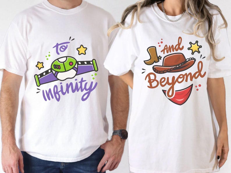 May include: Two white t-shirts with matching graphics. One shirt features a green and purple space ranger design with the words "to infinity". The other shirt has a cowboy hat, boot, and the words "and beyond".