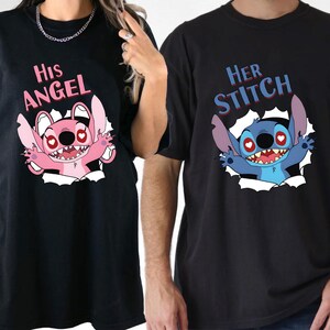 May include: Black t-shirts featuring cartoon character designs. One shirt displays "His Angel" with a pink character, the other "Her Stitch" with a blue character. Both characters are bursting through a white backdrop.