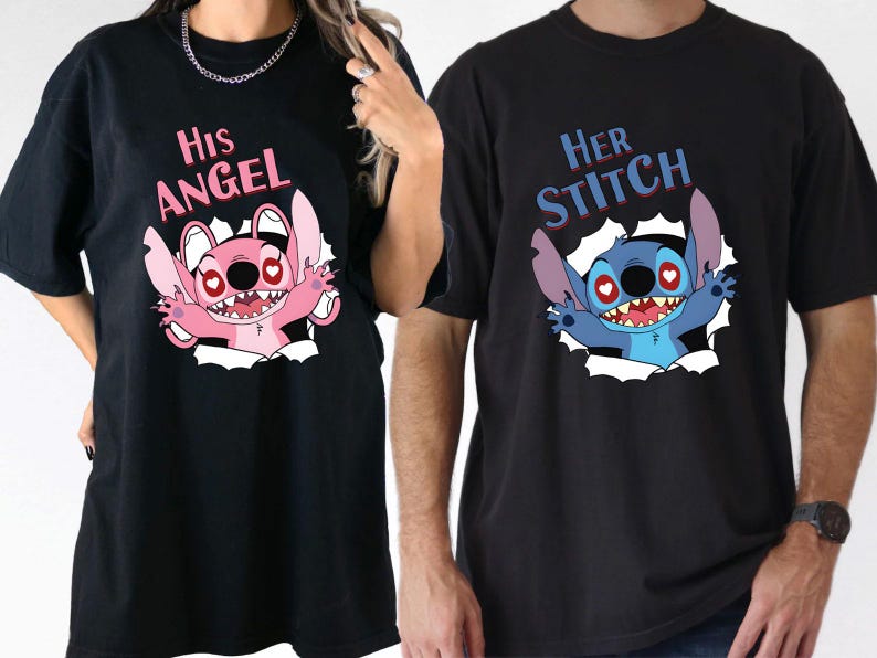 May include: Black t-shirts featuring cartoon character designs. One shirt displays "His Angel" with a pink character, the other "Her Stitch" with a blue character. Both characters are bursting through a white backdrop.