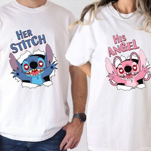 May include: Two white t-shirts with matching cartoon graphics. One shirt features a blue Stitch character with the text "Her Stitch". The other shirt has a pink Stitch character with the text "His Angel".