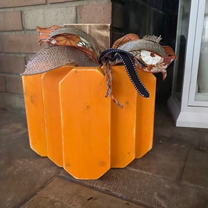 Hand-Painted Wood Pumpkin: Rustic Fall Decor with Ribbon