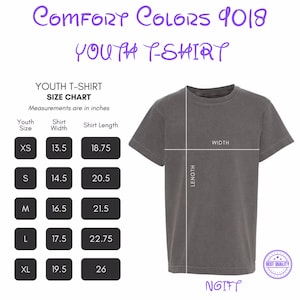 May include: A grey Comfort Colors youth t-shirt with a size chart showing measurements in inches. The chart includes sizes XS to XL, with corresponding shirt width and length measurements. The shirt has a crew neck and short sleeves.
