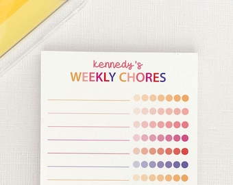 May include: A white printable chore chart with the text "kennedy's WEEKLY CHORES" at the top. The chart has 20 lines for writing chores and a column of colorful dots to the right.