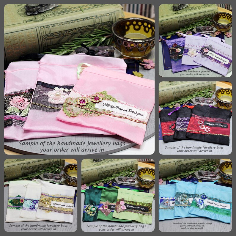 May include: A collection of small fabric drawstring pouches in various colors including pink, purple, black, white, green, and blue. Each pouch features decorative lace trim, floral appliques, and a white label reading White Raven Designs.