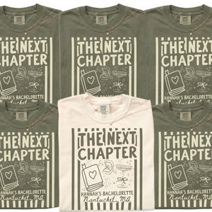 May include: Five olive green t-shirts and one cream t-shirt featuring a graphic print with vertical stripes, the text THE NEXT CHAPTER, HANNAH'S BACHELORETTE, NANTUCKET, MA, and illustrations of a book with a heart, a ring box, and a champagne glass.