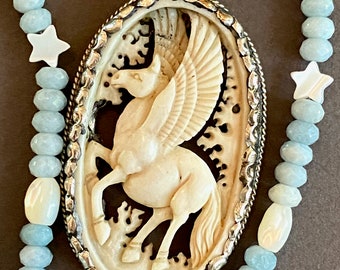 Pegasus Pendant Necklace Exquisite Carved Bone Winged Horse w Blue Kyanite Aquamarine and MOP Stars Two Strands Sky Blue Gemstone Jewelry