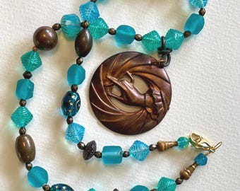 Aqua and Copper Necklace Frosted Glass Beads w Copper Hand Pendant Boho Jewelry