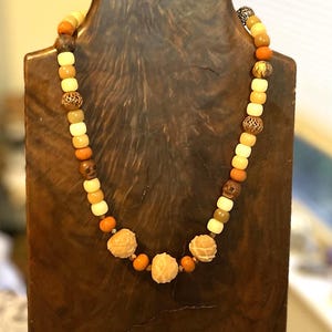 Lotus Flower Necklace w Carved Bodhi Seeds and Orange Java Glass Beads Boho Jewelry