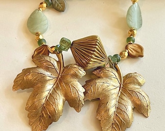Vintage Brass Leaves Necklace with Soft Green Serpentine, Czech Glass, and Gold Accents