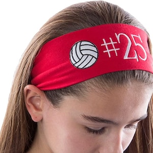 May include: Red headband with a white volleyball and the number 25 embroidered on it.