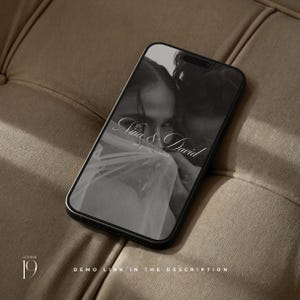 May include: A black smartphone displaying a grayscale wedding invitation graphic with the text Nina & David are getting married. The screen also features the date October 19 and the text demo link in the description at the bottom of the display.