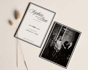 May include: Two wedding announcements with black borders and elegant script. One features the names "Sophia and Ben" and event details. The other is a black and white photo with the words "Save the Date". Dried ornamental grass adds a decorative touch.