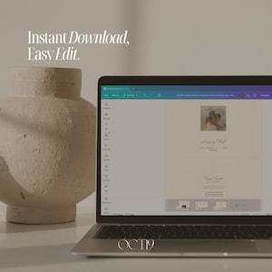 May include: A laptop displaying a digital design interface for a wedding invitation template with the text Instant Download, Easy Edit. Next to the laptop is a large, textured, beige ceramic vase with a wide body and a narrow neck.