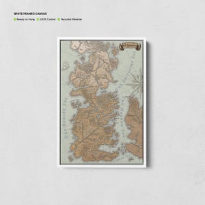May include: A white framed canvas print of a map of Westeros, the fictional continent from the Game of Thrones series. The map is in a vintage style with brown and beige colors. The map is surrounded by a white frame.