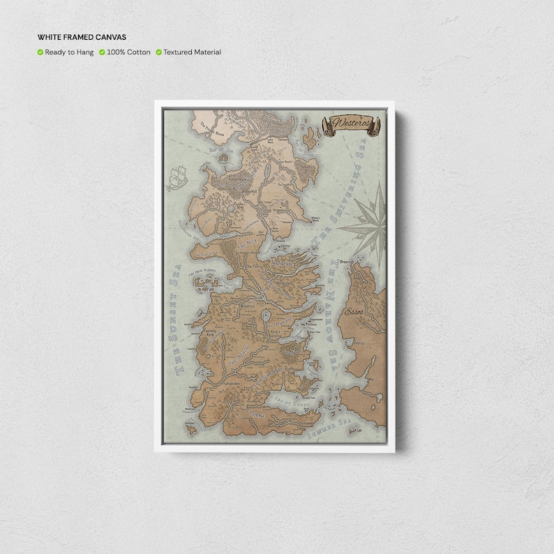 May include: A white framed canvas print of a map of Westeros, the fictional continent from the Game of Thrones series. The map is in a vintage style with brown and beige colors. The map is surrounded by a white frame.