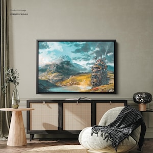 May include: Framed canvas art featuring a fantasy landscape with a large, moving castle and snow-capped mountains. The artwork has a watercolor style with a color palette of blues, greens, and browns. The canvas is framed in black.