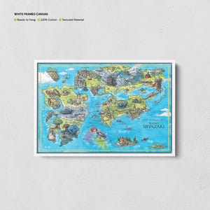 May include: A white framed canvas print displaying a vibrant illustrated map with the text "THE WORLD OF HAYAO MIYAZAKI". The map showcases diverse landscapes and characters in a whimsical style, set against a blue ocean backdrop.