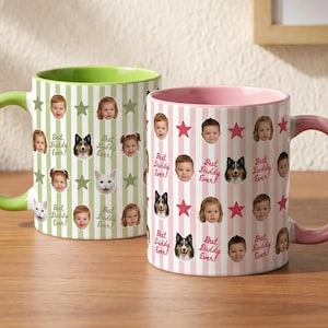 May include: Two ceramic mugs with colorful designs. One mug has a green handle and interior, the other has a pink handle and interior. Both mugs feature a pattern of faces, stars, and the text "Best Daddy Ever!"